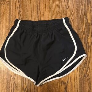 Nike Black and White Athletic Shorts with Swoosh Design